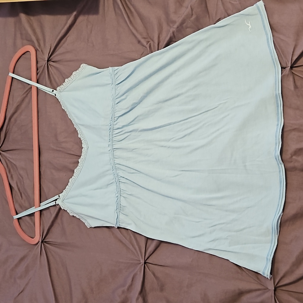 Light blue tank top. Size large. Smoke free home.